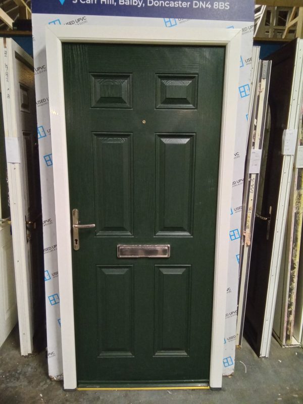 Used dark green on white composite front door 980mm x 2080mm 0671