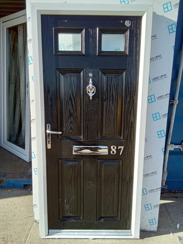 Used black and white composite front fire door 915mm x 1970mm C3D2