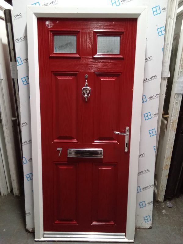 Used red on white composite front fire door 905mm x 1950mm 0510