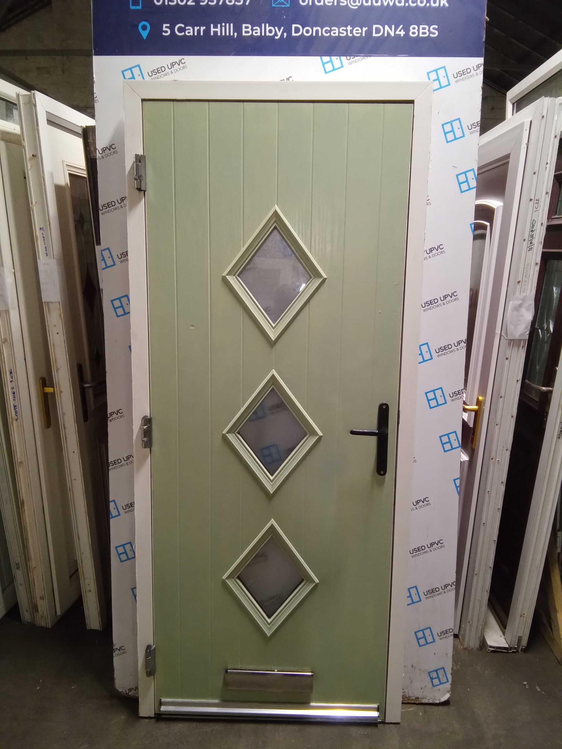 Used Chartwell green OUTWARD OPENING composite front door 910mm x 2080mm  0837