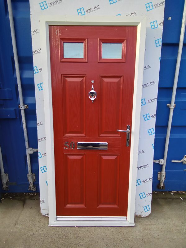 Used red composite front fire door 900mm x 1995mm C1D15