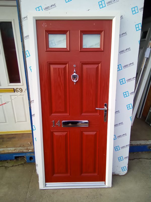 Used red composite front fire door 885mm x 1965mm C1D25